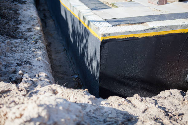 Professional Waterproofing technician working in Dunlap, TN